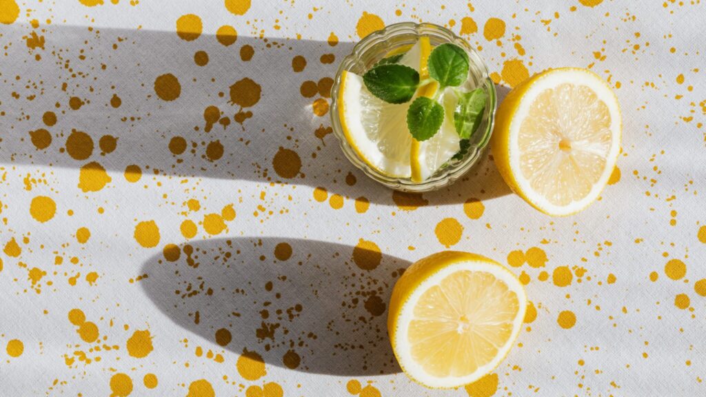 glass of lemonade and a lemon to show making the best of ototoxic drugs that led to hearing loss